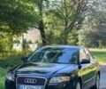 Чорний Ауді А4, об'ємом двигуна 2 л та пробігом 330 тис. км за 6400 $, фото 1 на Automoto.ua