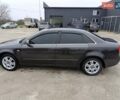 Черный Ауди А4, объемом двигателя 1.6 л и пробегом 302 тыс. км за 5700 $, фото 2 на Automoto.ua