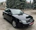 Черный Ауди А4, объемом двигателя 1.6 л и пробегом 198 тыс. км за 6100 $, фото 1 на Automoto.ua