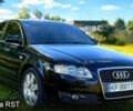 Черный Ауди А4, объемом двигателя 2 л и пробегом 300 тыс. км за 5800 $, фото 1 на Automoto.ua