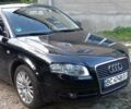 Черный Ауди А4, объемом двигателя 2 л и пробегом 230 тыс. км за 7500 $, фото 1 на Automoto.ua