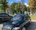 Чорний Ауді А4, об'ємом двигуна 2 л та пробігом 400 тис. км за 4715 $, фото 1 на Automoto.ua
