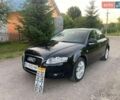 Черный Ауди А4, объемом двигателя 1.6 л и пробегом 166 тыс. км за 8390 $, фото 1 на Automoto.ua