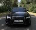 Черный Ауди А4, объемом двигателя 2 л и пробегом 250 тыс. км за 10800 $, фото 1 на Automoto.ua