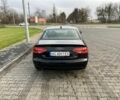Черный Ауди А4, объемом двигателя 2 л и пробегом 256 тыс. км за 9900 $, фото 3 на Automoto.ua