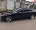 Черный Ауди А4, объемом двигателя 2 л и пробегом 249 тыс. км за 8800 $, фото 1 на Automoto.ua