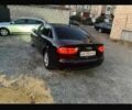 Черный Ауди А4, объемом двигателя 2 л и пробегом 243 тыс. км за 12800 $, фото 1 на Automoto.ua
