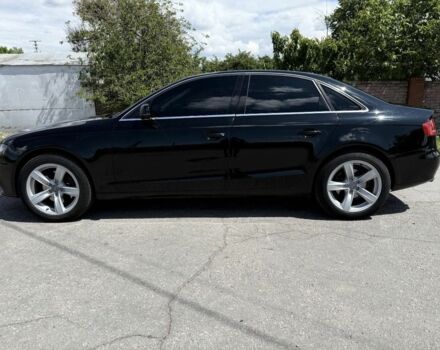 Черный Ауди А4, объемом двигателя 2 л и пробегом 275 тыс. км за 9200 $, фото 1 на Automoto.ua