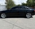 Черный Ауди А4, объемом двигателя 2 л и пробегом 275 тыс. км за 9200 $, фото 1 на Automoto.ua