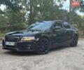 Чорний Ауді А4, об'ємом двигуна 2 л та пробігом 140 тис. км за 11499 $, фото 1 на Automoto.ua