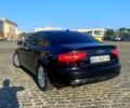 Ауді А4 2012 у Харкові на Automoto.ua Чорний Ауді А4, об'ємом двигуна 2 л та пробігом 260 тис. км за 12500 $, фото 5 на Automoto.ua