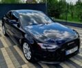 Черный Ауди А4, объемом двигателя 2 л и пробегом 150 тыс. км за 10700 $, фото 1 на Automoto.ua