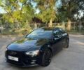Черный Ауди А4, объемом двигателя 2 л и пробегом 210 тыс. км за 11500 $, фото 1 на Automoto.ua