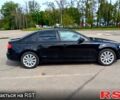 Черный Ауди А4, объемом двигателя 2 л и пробегом 172 тыс. км за 9300 $, фото 1 на Automoto.ua