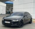 Черный Ауди А4, объемом двигателя 1.8 л и пробегом 165 тыс. км за 12500 $, фото 1 на Automoto.ua