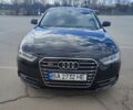 Черный Ауди А4, объемом двигателя 1.98 л и пробегом 218 тыс. км за 11100 $, фото 1 на Automoto.ua