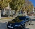 Черный Ауди А4, объемом двигателя 2 л и пробегом 198 тыс. км за 10250 $, фото 1 на Automoto.ua