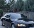 Чорний Ауді А4, об'ємом двигуна 2 л та пробігом 180 тис. км за 10035 $, фото 1 на Automoto.ua