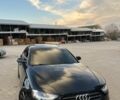 Чорний Ауді А4, об'ємом двигуна 2 л та пробігом 198 тис. км за 10900 $, фото 1 на Automoto.ua