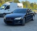 Чорний Ауді А4, об'ємом двигуна 2 л та пробігом 199 тис. км за 10400 $, фото 1 на Automoto.ua