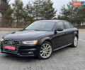 Чорний Ауді А4, об'ємом двигуна 2 л та пробігом 225 тис. км за 12900 $, фото 1 на Automoto.ua