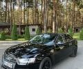 Черный Ауди А4, объемом двигателя 2 л и пробегом 180 тыс. км за 10201 $, фото 1 на Automoto.ua