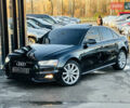 Чорний Ауді А4, об'ємом двигуна 2 л та пробігом 230 тис. км за 10999 $, фото 7 на Automoto.ua