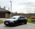 Черный Ауди А4, объемом двигателя 2 л и пробегом 200 тыс. км за 13000 $, фото 1 на Automoto.ua