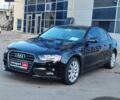 Черный Ауди А4, объемом двигателя 2 л и пробегом 138 тыс. км за 12790 $, фото 1 на Automoto.ua
