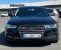 Черный Ауди А4, объемом двигателя 2 л и пробегом 258 тыс. км за 11000 $, фото 1 на Automoto.ua