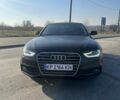 Чорний Ауді А4, об'ємом двигуна 2 л та пробігом 215 тис. км за 12000 $, фото 1 на Automoto.ua