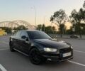 Чорний Ауді А4, об'ємом двигуна 2 л та пробігом 184 тис. км за 11900 $, фото 1 на Automoto.ua