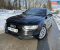 Черный Ауди А4, объемом двигателя 2 л и пробегом 210 тыс. км за 12900 $, фото 1 на Automoto.ua