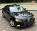 Черный Ауди А4, объемом двигателя 2 л и пробегом 150 тыс. км за 10450 $, фото 1 на Automoto.ua