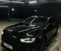 Черный Ауди А4, объемом двигателя 2 л и пробегом 158 тыс. км за 13500 $, фото 1 на Automoto.ua