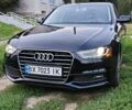 Черный Ауди А4, объемом двигателя 2 л и пробегом 164 тыс. км за 13613 $, фото 1 на Automoto.ua