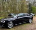 Чорний Ауді А4, об'ємом двигуна 2 л та пробігом 172 тис. км за 13200 $, фото 1 на Automoto.ua