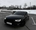 Чорний Ауді А4, об'ємом двигуна 2 л та пробігом 170 тис. км за 13538 $, фото 1 на Automoto.ua