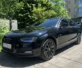 Чорний Ауді А4, об'ємом двигуна 2 л та пробігом 205 тис. км за 13300 $, фото 1 на Automoto.ua