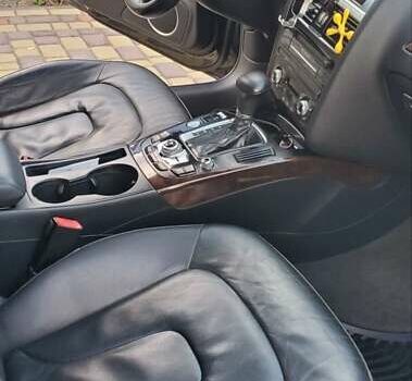 Черный Ауди А4, объемом двигателя 1.98 л и пробегом 126 тыс. км за 16700 $, фото 69 на Automoto.ua