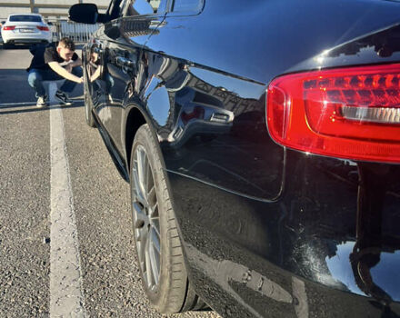 Чорний Ауді А4, об'ємом двигуна 2 л та пробігом 110 тис. км за 14400 $, фото 2 на Automoto.ua