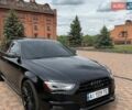 Чорний Ауді А4, об'ємом двигуна 2 л та пробігом 170 тис. км за 14300 $, фото 1 на Automoto.ua