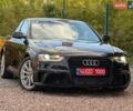 Черный Ауди А4, объемом двигателя 2 л и пробегом 201 тыс. км за 10999 $, фото 1 на Automoto.ua