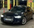 Черный Ауди А4, объемом двигателя 1.98 л и пробегом 207 тыс. км за 12500 $, фото 1 на Automoto.ua