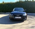 Чорний Ауді А4, об'ємом двигуна 2 л та пробігом 218 тис. км за 12800 $, фото 1 на Automoto.ua