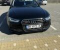 Черный Ауди А4, объемом двигателя 2 л и пробегом 185 тыс. км за 13900 $, фото 1 на Automoto.ua