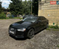 Черный Ауди А4, объемом двигателя 2 л и пробегом 148 тыс. км за 16000 $, фото 1 на Automoto.ua