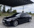 Черный Ауди А4, объемом двигателя 2 л и пробегом 150 тыс. км за 12698 $, фото 1 на Automoto.ua