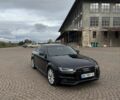 Чорний Ауді А4, об'ємом двигуна 2 л та пробігом 163 тис. км за 13785 $, фото 1 на Automoto.ua