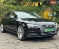 Черный Ауди А4, объемом двигателя 2 л и пробегом 140 тыс. км за 19900 $, фото 1 на Automoto.ua